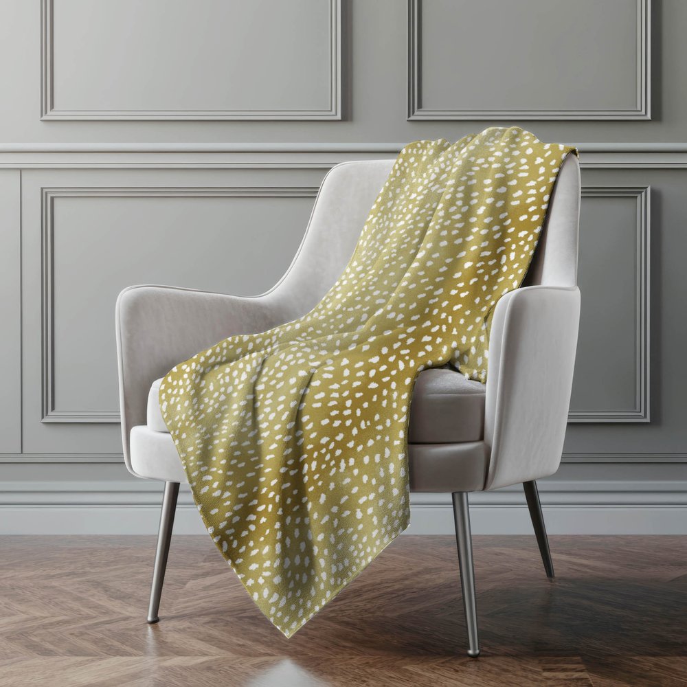 50" X 70" Ivory And Gold Animal Print Polyester Woven Plush Throw Blanket