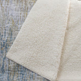 50" X 70" Beige Blue And Gold Abstract Plush Throw Blanket