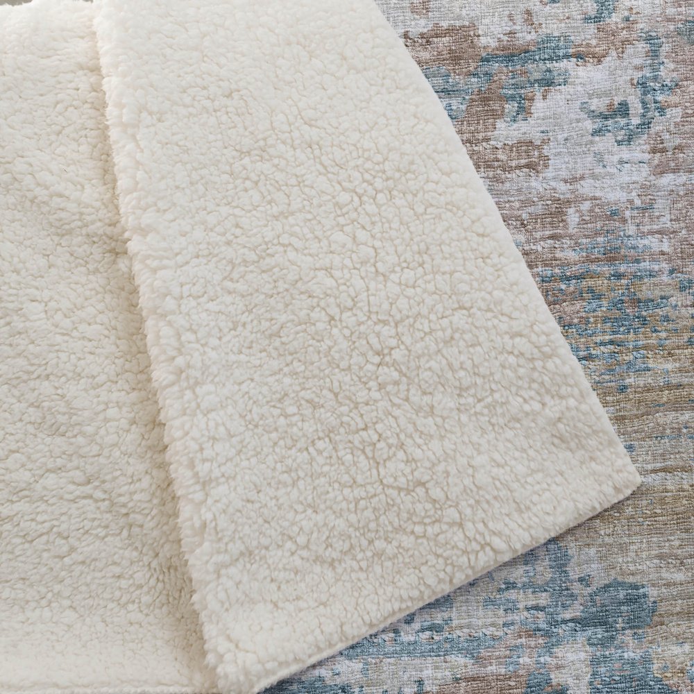 50" X 70" Teal Beige And Ivory Abstract Polyester Woven Plush Throw Blanket