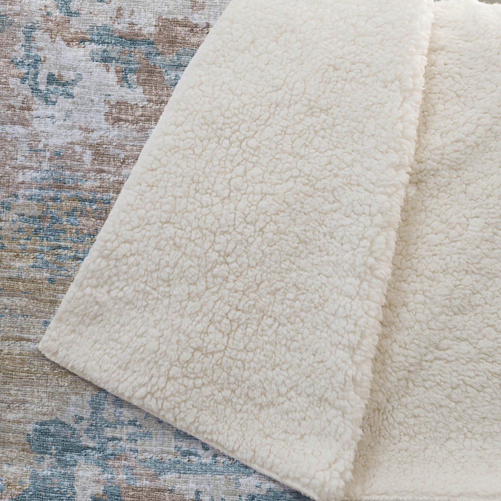 50" X 70" Teal Beige And Ivory Abstract Polyester Woven Plush Throw Blanket