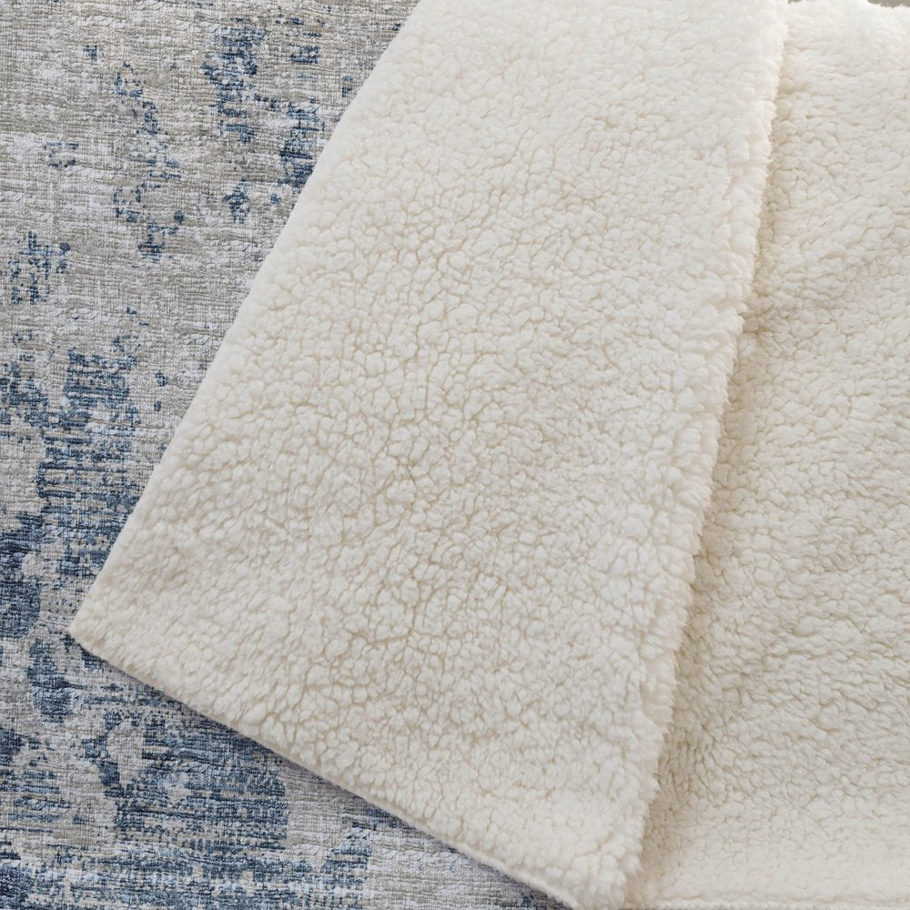 50" X 70" Blue Beige And Ivory Abstract Polyester Woven Plush Throw Blanket