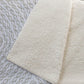 50" X 70" Linen And Ivory Abstract Polyester Woven Plush Throw Blanket