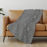 50" X 70" Charcoal And Ivory Abstract Polyester Woven Plush Throw Blanket