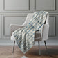 50" X 70" Ivory And Teal Geometric Polyester Woven Plush Throw Blanket