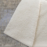 50" X 70" Chocolate And Beige Geometric Polyester Woven Plush Throw Blanket