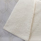 50" X 70" Ivory And Beige Geometric Polyester Woven Plush Throw Blanket