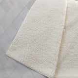 50" X 70" Ivory And Beige Geometric Polyester Woven Plush Throw Blanket