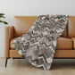 50" X 70" Gray And Ivory Geometric Polyester Woven Plush Throw Blanket