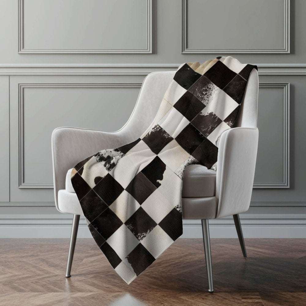 50" X 70" Black Ivory And Beige Animal Print Polyester Woven Plush Throw Blanket