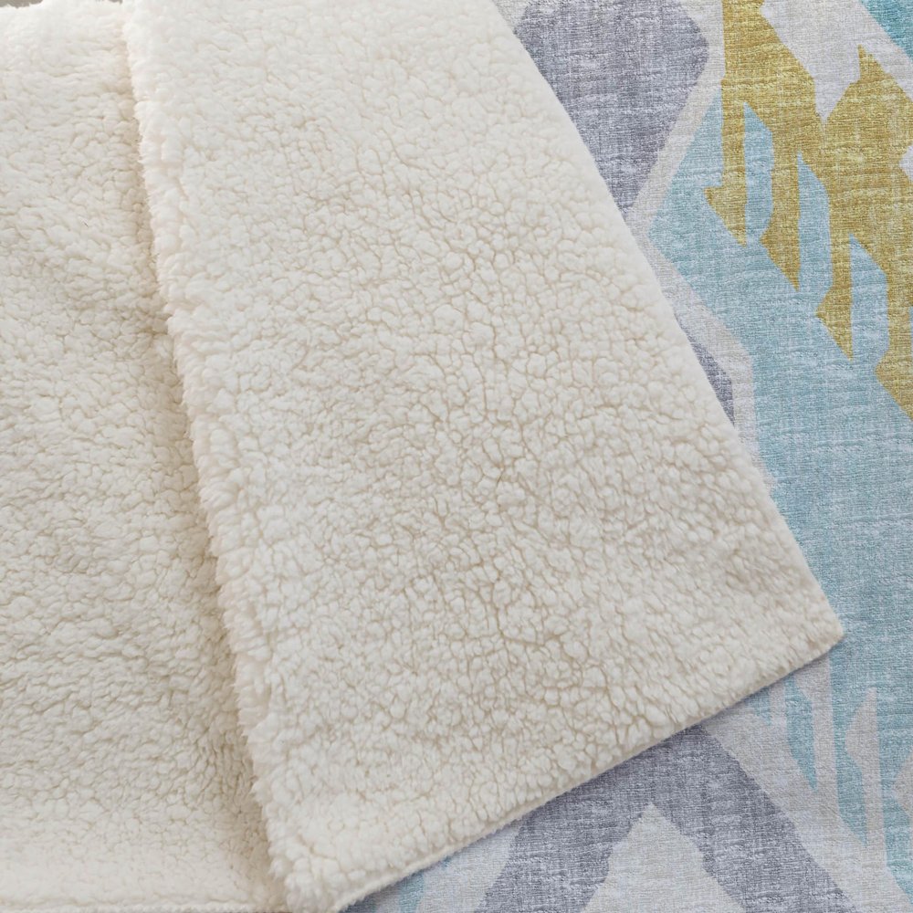 50" X 70" Aqua Gold And Ivory Microfiber Ikat Plush Throw Blanket