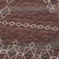 50" X 70" Rust And Ivory Geometric Polyester Woven Plush Throw Blanket