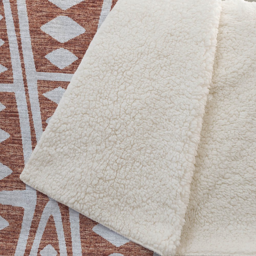 50" X 70" Rust And Beige Geometric Polyester Woven Plush Throw Blanket