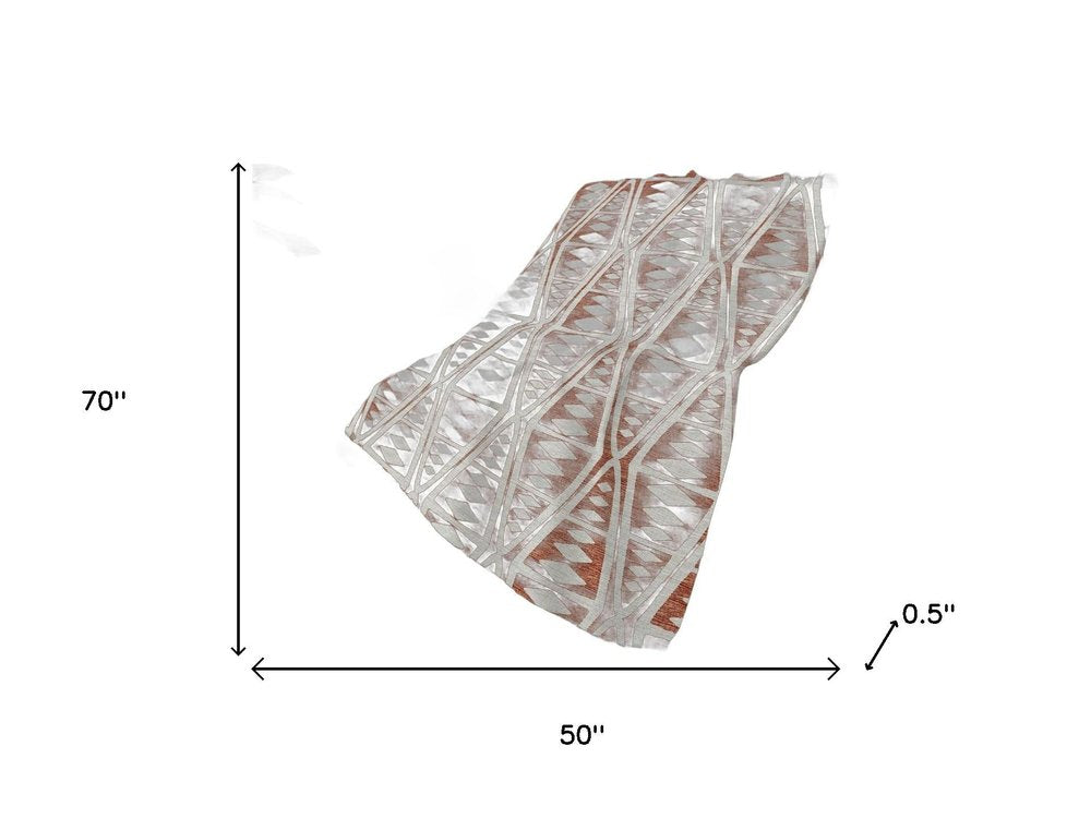 50" X 70" Rust And Beige Geometric Polyester Woven Plush Throw Blanket