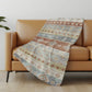 50" X 70" Desert Sand Rust And Ivory Geometric Polyester Woven Plush Throw Blanket
