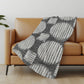 50" X 70" Gray And Ivory Geometric Polyester Woven Plush Throw Blanket
