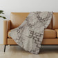 50" X 70" Chocolate And Taupe Abstract Polyester Woven Plush Throw Blanket