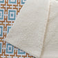 50" X 70" Orange Ivory And Teal Geometric Microfiber Plush Throw Blanket