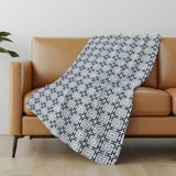 50" X 70" Navy Blue And Ivory Geometric Polyester Woven Plush Throw Blanket
