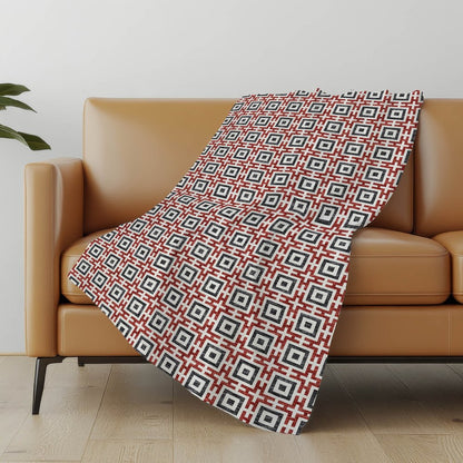 50" X 70" Red Ivory And Black Geometric Polyester Woven Plush Throw Blanket