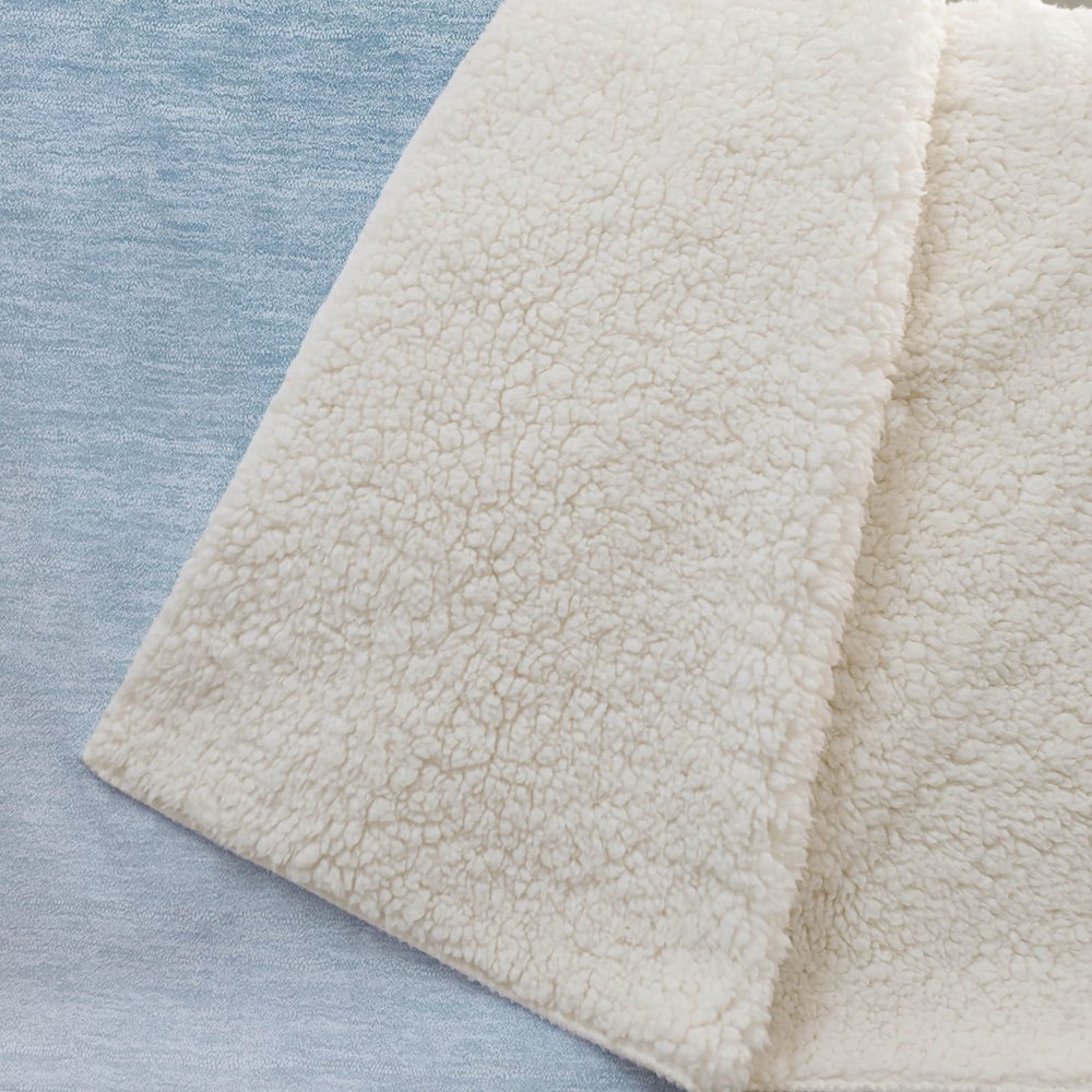 50" X 70" Blue Emerald And Ivory Animal Print Polyester Woven Plush Throw Blanket