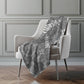 50" X 70" Gray And Ivory Geometric Polyester Woven Plush Throw Blanket