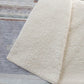 50" X 70" Gray Beige And Ivory Geometric Polyester Woven Plush Throw Blanket