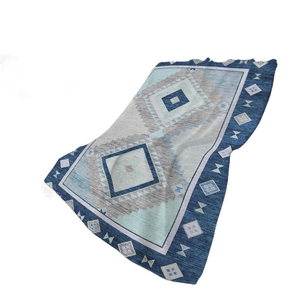 50" X 70" Blue And Ivory Geometric Polyester Woven Plush Throw Blanket