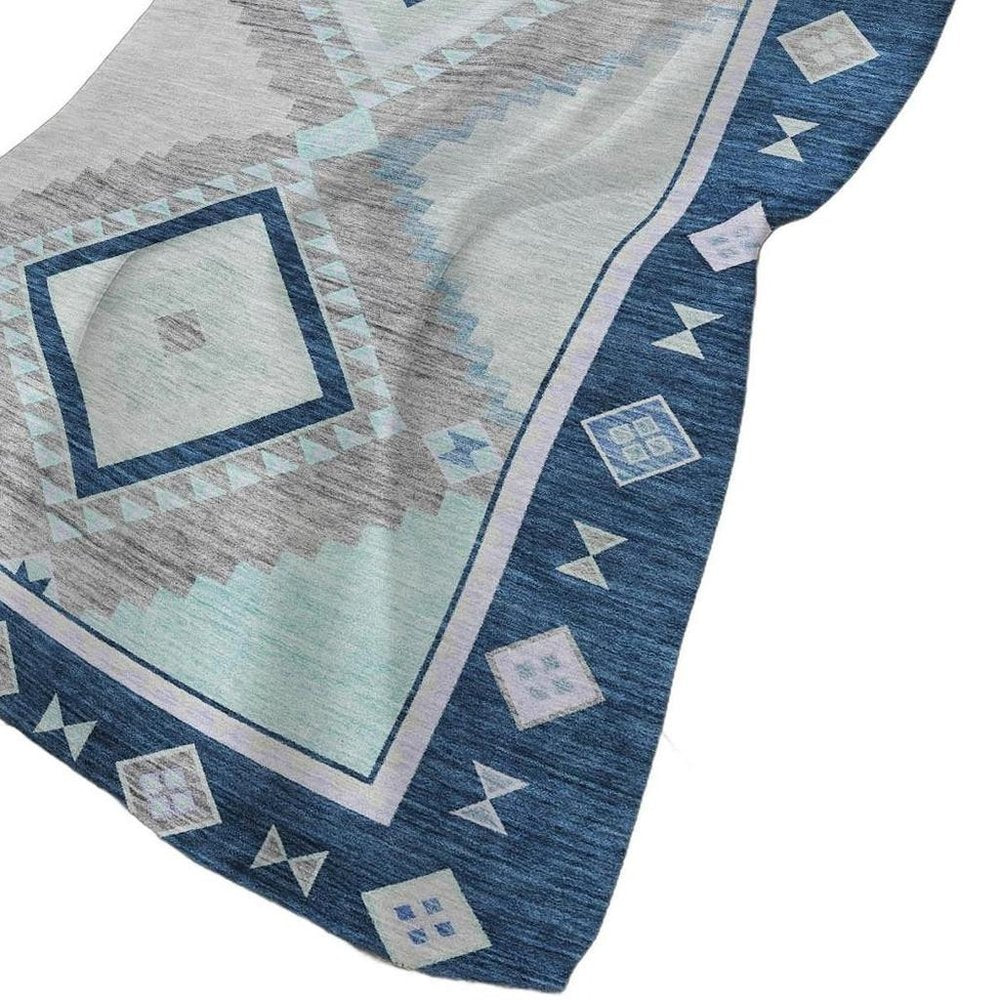 50" X 70" Blue And Ivory Geometric Polyester Woven Plush Throw Blanket