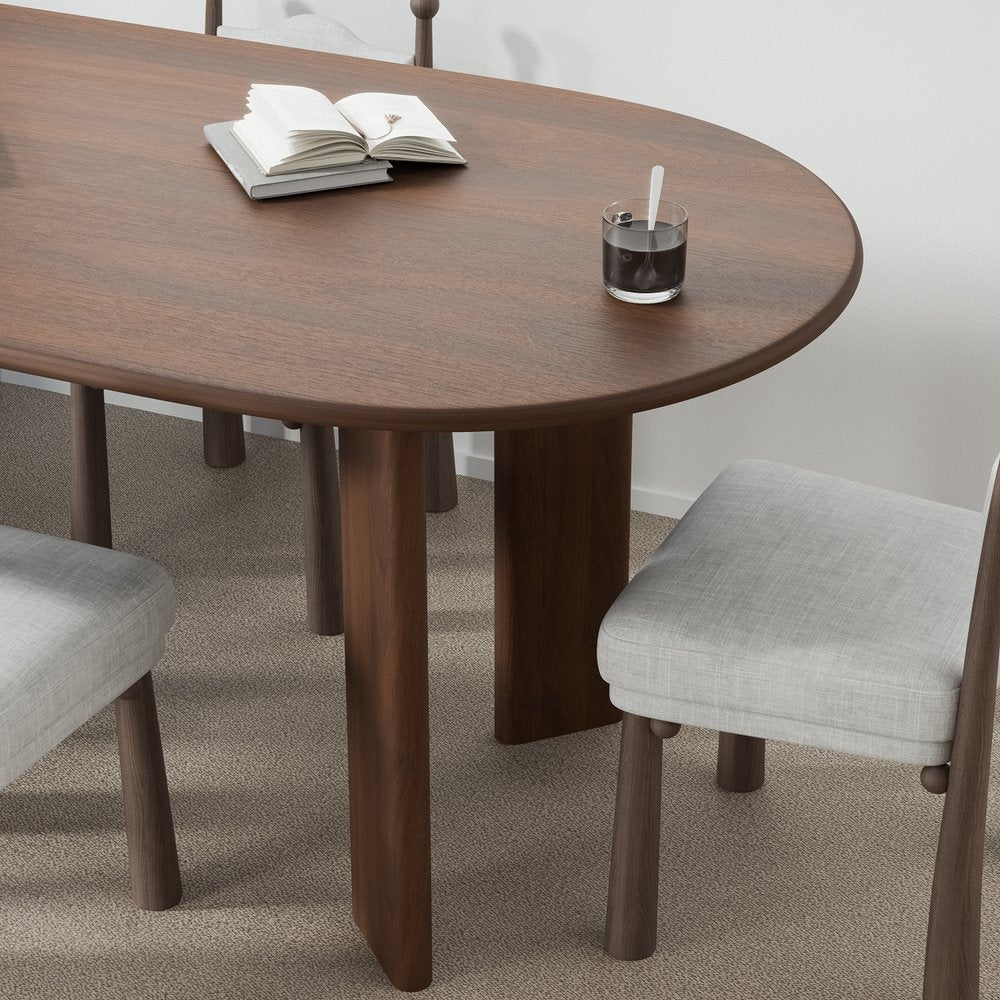 66" Brown Solid Wood Oval Dining Table