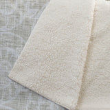 50" X 70" Beige And Ivory Animal Print Polyester Woven Plush Throw Blanket