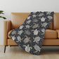 50" X 70" Midnight Gray And Ivory Animal Print Polyester Woven Plush Throw Blanket
