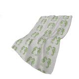 50" X 70" Green And Ivory Animal Print Polyester Woven Plush Throw Blanket