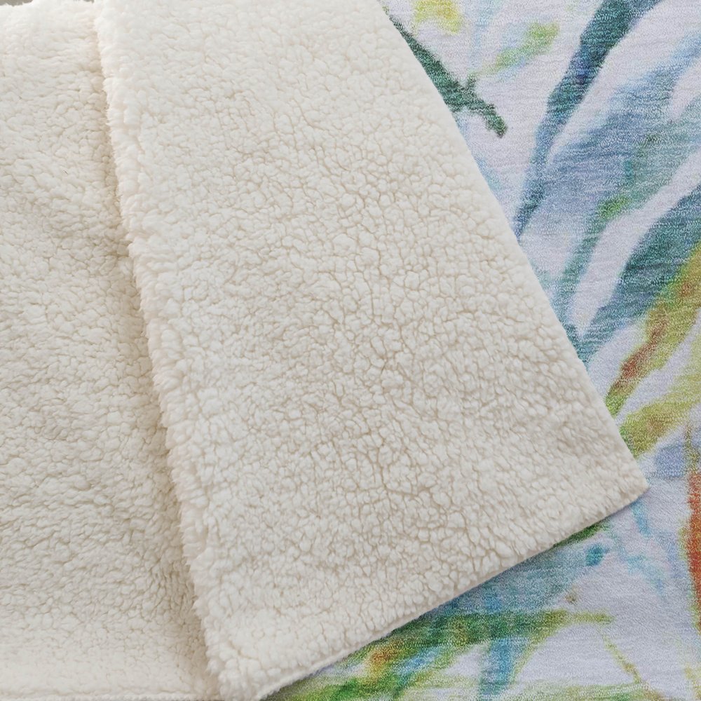 50" X 70" Ivory Blue And Green Leaves Polyester Woven Plush Throw Blanket