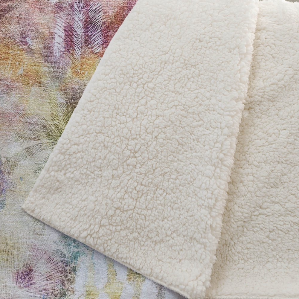 50" X 70" Ivory Peach And Blue Leaves Polyester Woven Plush Throw Blanket