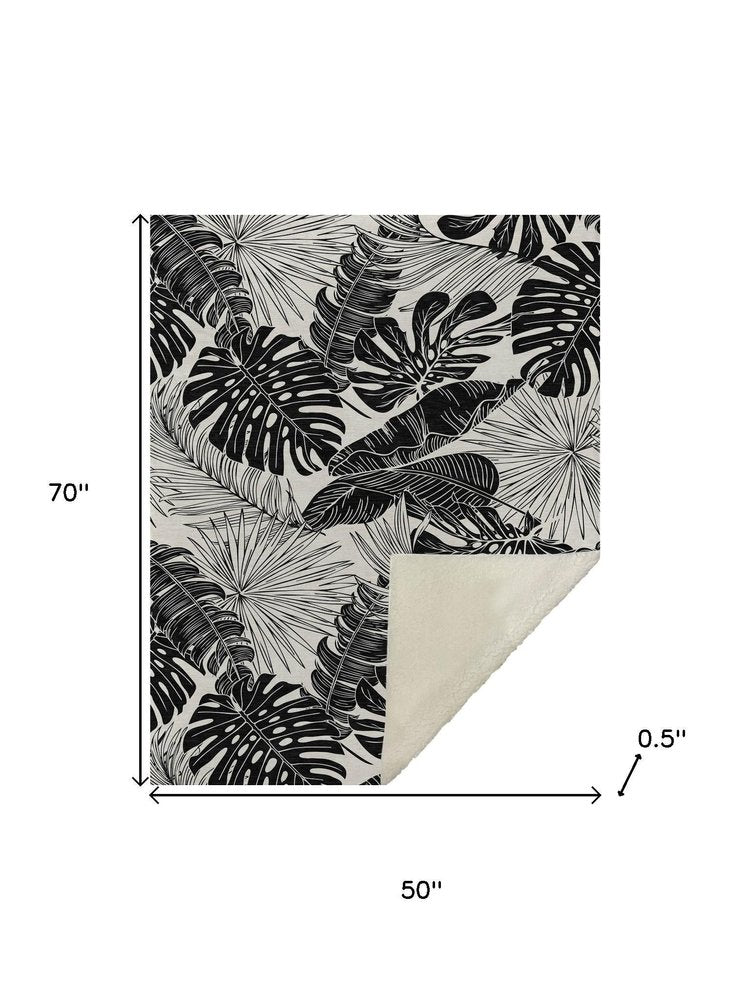 50" X 70" Midnight And Ivory Leaves Polyester Woven Plush Throw Blanket